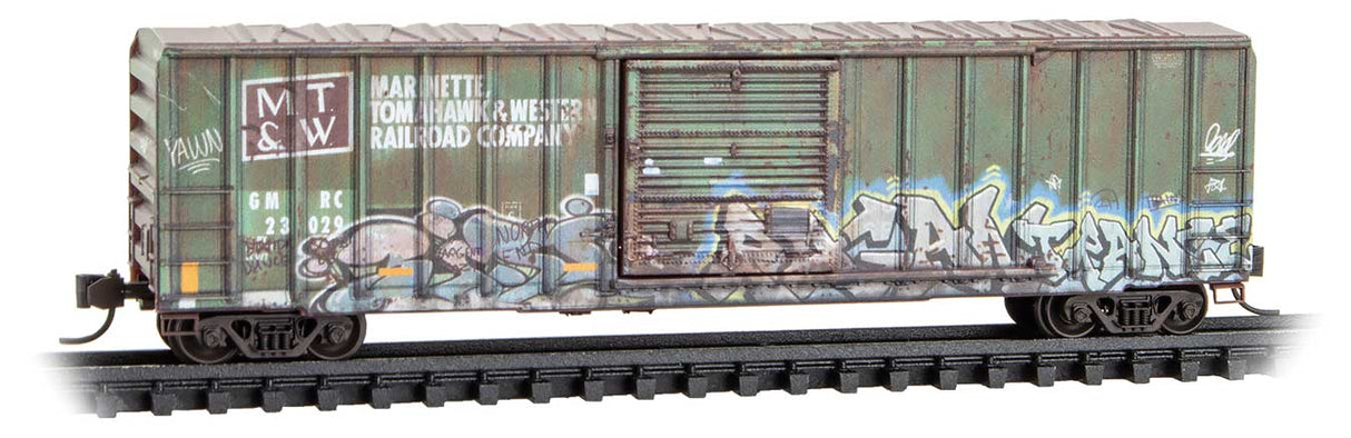 Micro-Trains N 50' Rib-Side Single-Door Boxcar No Roofwalk - Ready to Run -- Green Mountain #23029 (Ex-MT&W Weathered, green, Graffiti, Per Diem #7)