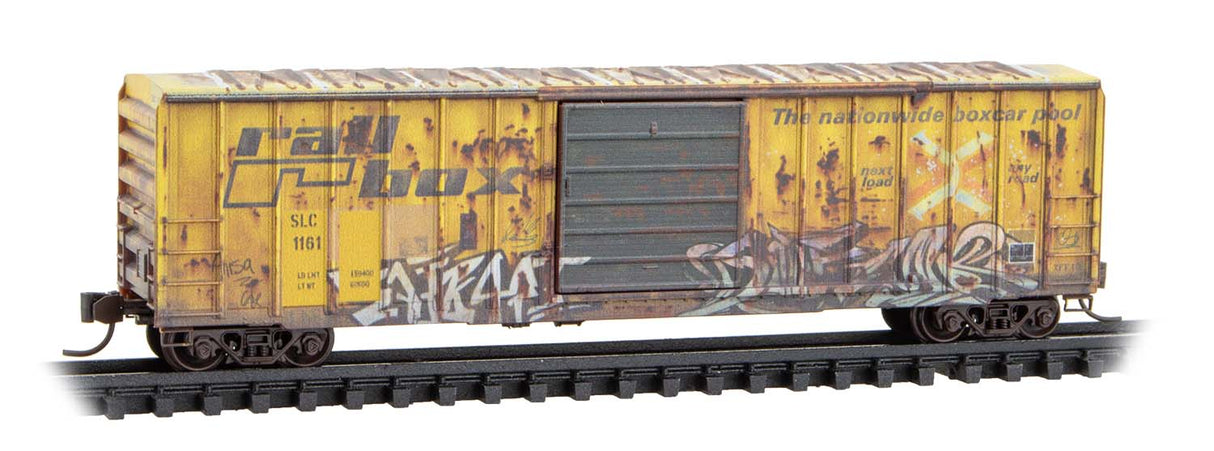 Micro-Trains 025 44 442 N 50' Rib-Side Single-Door Boxcar No Roofwalk - Ready to Run -- San Luis Central #1161 (Weathered, Ex-Railbox, yellow, graffiti, Series #6)