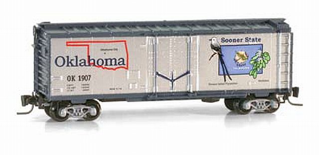 Micro-Trains 50-State Car Series - 40' Plug-Door Boxcar -- Oklahoma #1907 (#29 in Series; silver, blue) - 489-50200529
