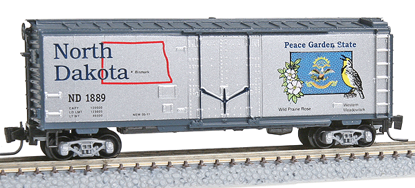 Micro-Trains 50-State Car Series - 40' Plug-Door Boxcar -- North Dakota #1889 (#34 in Series; silver, blue) - 489-50200534