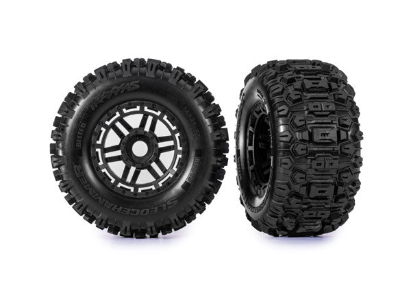 Traxxas 8979 Tires & Wheels, assembled, glued (black Wheels, belted Sledgehammer All-Terrain Tires, dual profile (2.9" outer, 3.8" inner), foam Inserts) (2) (17mm splined) (TSM Rated)