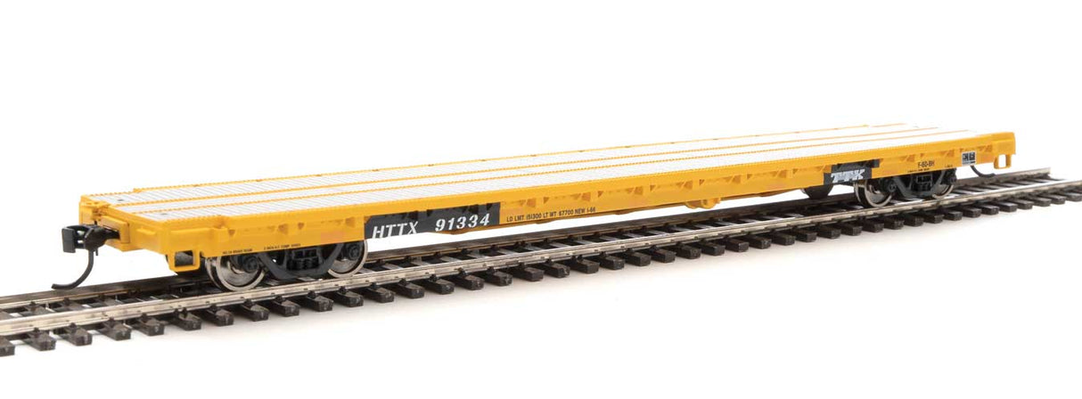 Walthers Mainline 60' Pullman-Standard Flatcar - Ready to Run -- Trailer Train HTTX #91334 (Heavy Duty Loading; yellow, black) - 910-5337