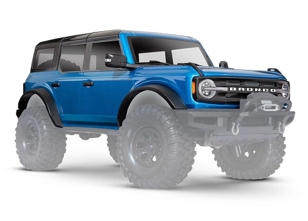 Traxxas 9211A Body, Ford Bronco (2021), Complete, Velocity - Blue (painted) (includes grille, side mirrors, door handles, fender flares, windshield wipers, spare tire Mount & clipless Mounting) (requires #8080X inner Fenders) - TRA9211A