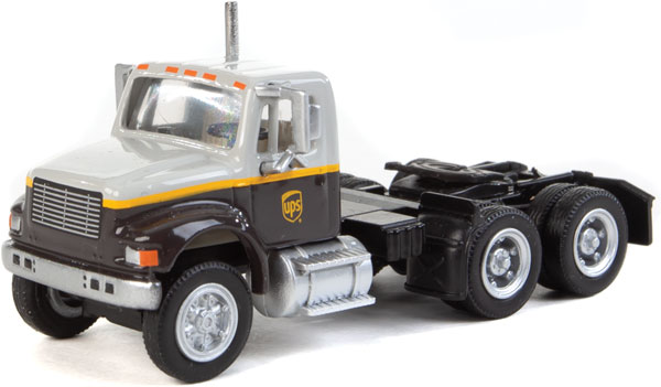 Walthers SceneMaster International(R) 4900 Dual-Axle Semi Tractor Only - Assembled -- UPS Freight(SM) (gray, gold, brown) - 949-11186