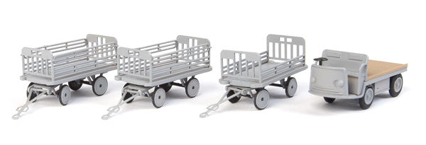 Walthers SceneMaster Baggage Tractor and Trailers - Plastic Kit -- Non-Powered Tractor and 3 Trailers (gray) - 949-4141