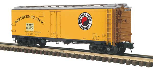 Atlas O 40' Steel Reefer - 3-Rail - Ready to Run - Master -- Northern Pacific WFEX #704704 (Patched, yellow, silver, Boxcar Red, Monad)