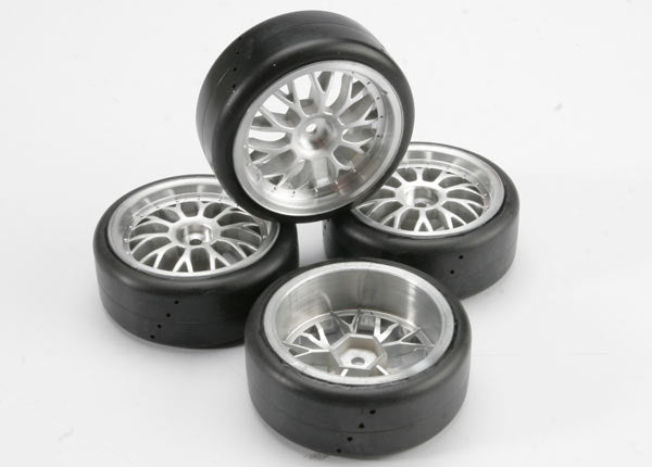 Traxxas 4873 Tires , Pro-Trax on-road (medium compound with contoured Inserts) (Mounted and glued to part #4872 Wheels) (2 left , 2 right) - TRA4873