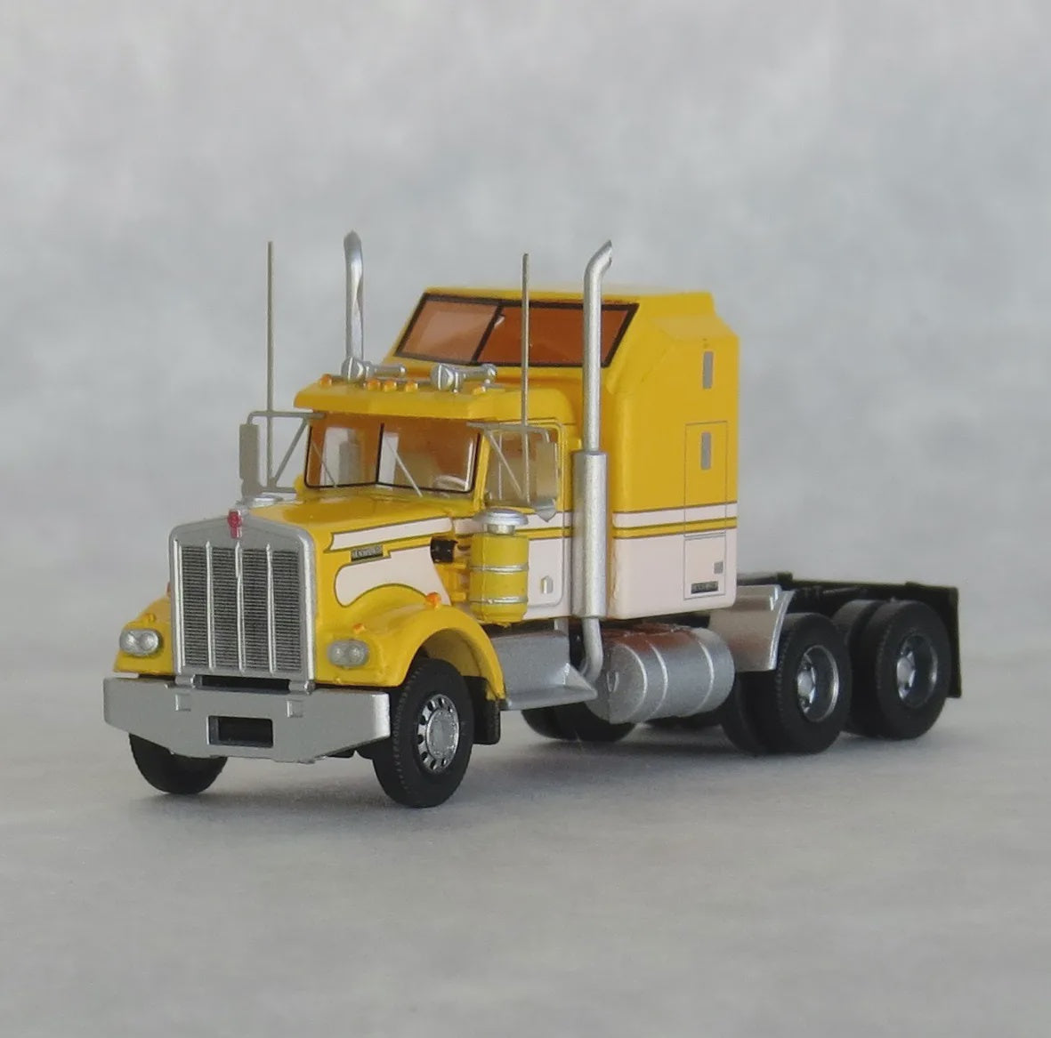 Trainworx N 1970s Kenworth W900 Seminole Tractor w/60" VIT Aerodyne Sleeper Cab- Assemb -- Yellow, White