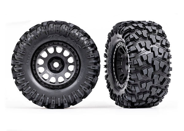 Traxxas 7875 Tires & Wheels, assembled, glued (XRT™ Race black Wheels, Maxx AT Tires, foam Inserts) (left & right) - TRA7875