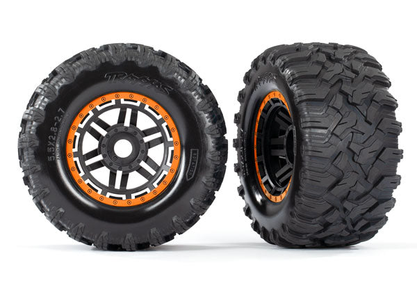 Traxxas 8972T Tires & Wheels, assembled, glued (black, orange beadlock style Wheels, Maxx MT Tires, foam Inserts) (2) (17mm splined) (TSM Rated) - TRA8972T
