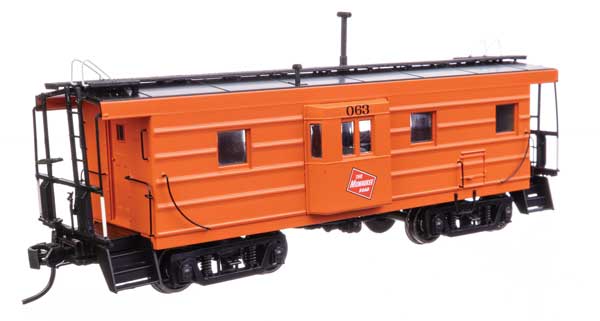 Milwaukee Road Rib Sided Caboose -- Milwaukee Road #063 orange, black; oil stove)