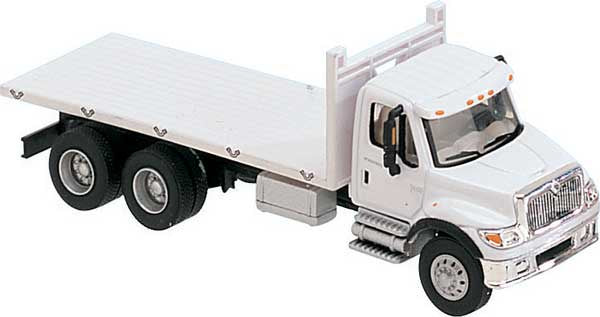 Walthers SceneMaster HO International(R) 7600 3-Axle Flatbed Truck - Assembled -- White with Railroad Maintenance-of-Way Logo Decals